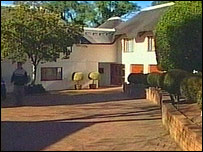 Sir Mark was arrested at his home in an exclusive suburb of Cape Town