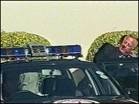 Sir Mark was taken to court in a police car