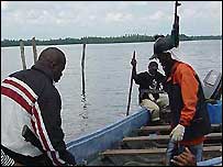 An armed gang in Nigeria's Niger Delta swamps