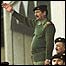 Saddam Hussein takes salute at Baghdad parade