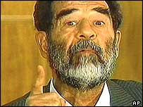 Footage of Saddam Hussein in court